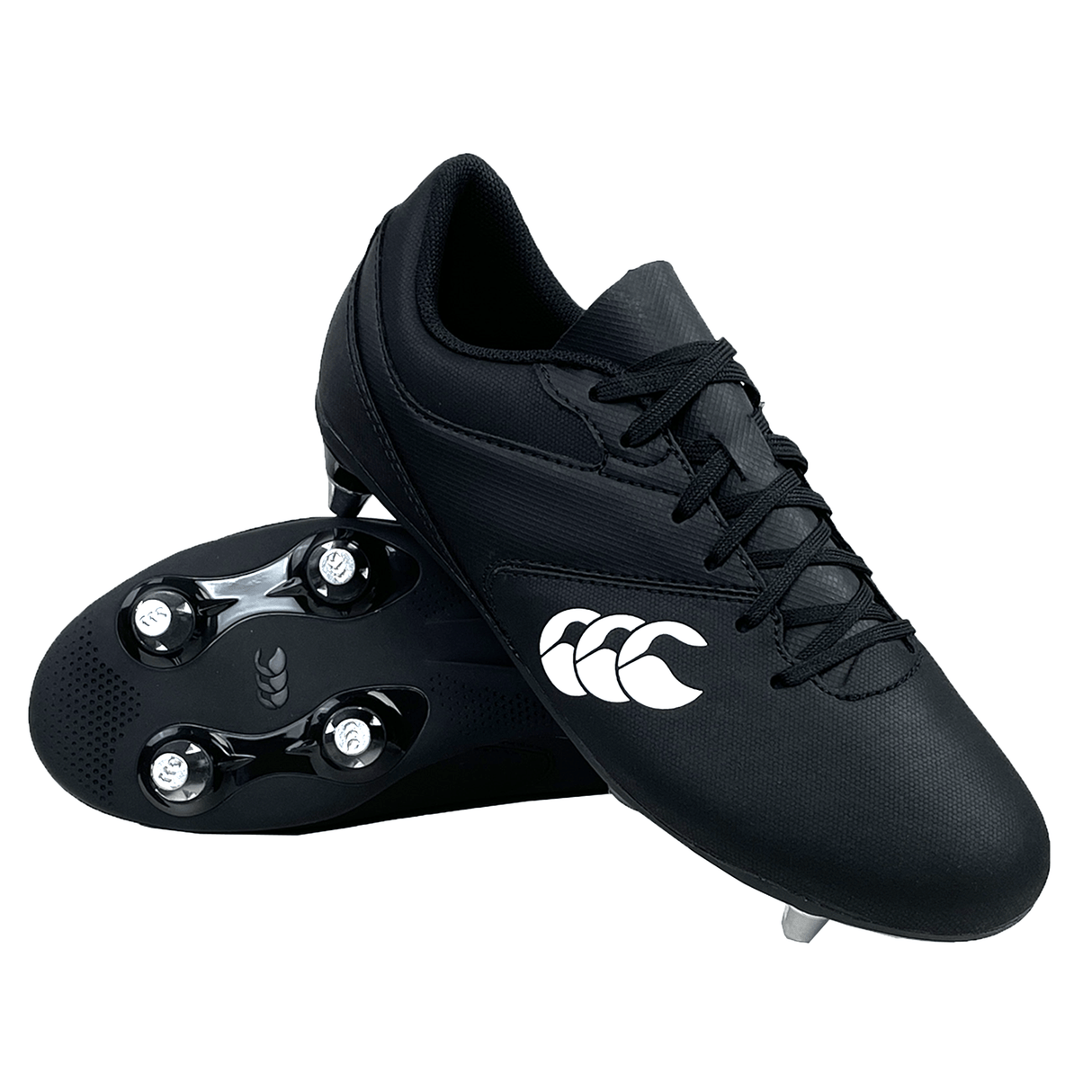 The Canterbury Junior Raze SG Boot in black and white features metal studs and a side logo, shown with one boot upright and the other displaying the sole.