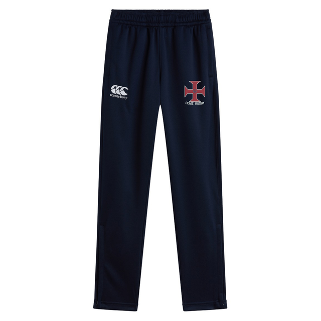 The SF CDME Rugby Stretch Tapered Pant by EMB Canterbury is a navy blue men's training pant with an elastic waist, showcasing the Canterbury logo on the left thigh and a red and white cross emblem with "CRVG" on the right thigh. Designed for comfort and quick-dry performance, these pants are perfect for all your athletic needs.