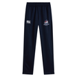 Navy blue stretch tapered SUNY Maritime Men’s Rugby Stretch Tapered Pant by Canterbury featuring a logo on the right thigh and a team crest on the left thigh.