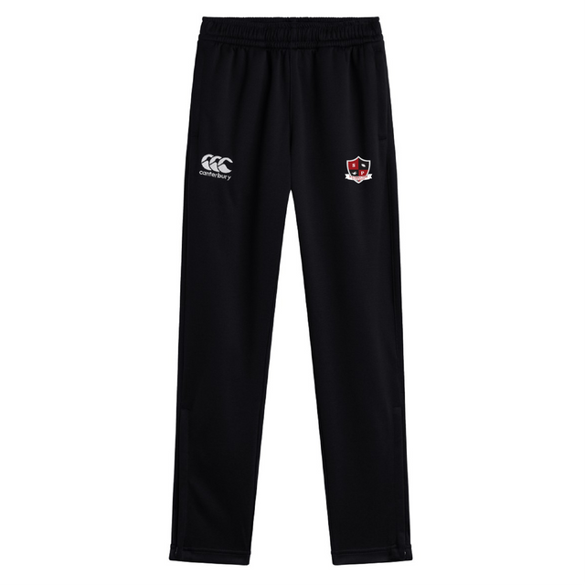 The Southern Pines Youth Rugby Stretch Tapered Pant by EMB Canterbury features a black design with an elastic waistband, a white logo on the left, and a red, black, and white crest on the right, combining comfort and style for any active occasion.