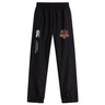 The Godzilla Rugby Football Club Cuffed Hem Stadium Pant by EMB Canterbury features black athletic pants with an elastic waistband and cuffs, highlighted by the iconic Canterbury of New Zealand logo and a colorful Redhill team badge on the left leg—making them the ideal men’s rugby pants for both training sessions and stadium events.