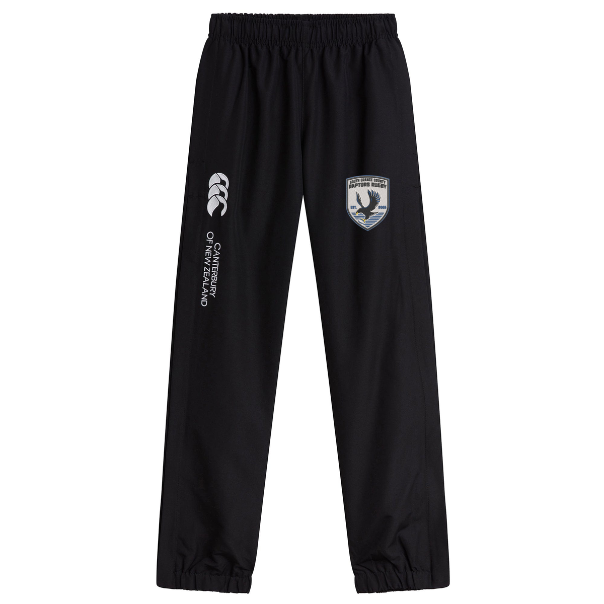 Updated Sentence: The South Orange County Raptors Cuffed Hem Stadium Pant by EMB Canterbury features black athletic fabric with an elastic waistband and cuffs, a white “Canterbury of New Zealand” logo, and a bird crest on the upper right leg. These classic men’s cuffed hem pants combine comfort and style for rugby fans or everyday wear.