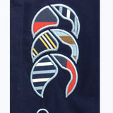 A close up of a Canterbury shirt with a design on it.