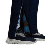A person's legs with a pair of Canterbury CCC Uglies Open Hem Stadium Pants on top of them.