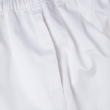 Close-up of Canterbury Professional Cotton Shorts from Bundle Canterbury, featuring a white cotton short with an elastic waistband and stitching detail.