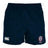 A pair of navy blue rugby shorts with a white elastic waistband, displaying logos for Canterbury and The Old Elthamians Rugby Club on the front. These "The Claremont Colleges Player's Drill Shorts" by EMB Canterbury are made from recycled fabric, combining style and sustainability effortlessly.