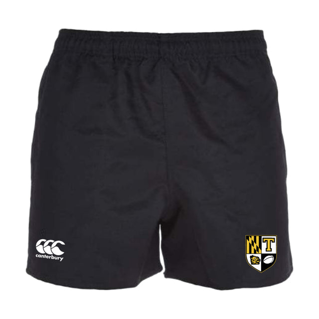 The Towson University Rugby Player's Drill Short by EMB Canterbury are black sports shorts made from recycled fabric, featuring an elastic waistband, the iconic white Canterbury logo on the left leg, and a yellow and black badge with a "T" and ball on the right leg, perfect for training.