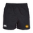 The University of Maryland Baltimore County Rugby Player's Drill Short by EMB Canterbury is black, made from recycled fabric, and features a white Canterbury logo on the left leg and a UMBC logo on the right.