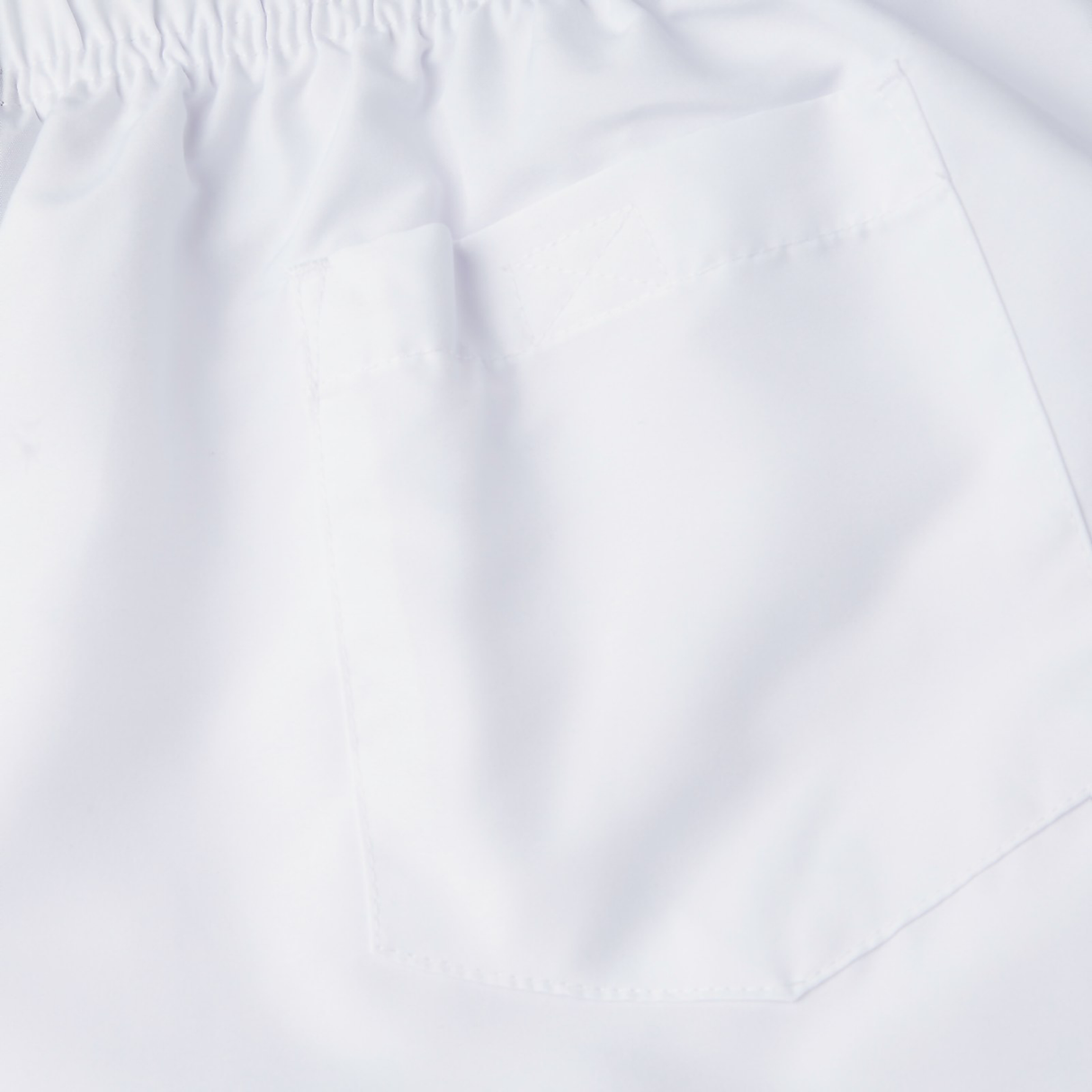 A close up of a white pocket on a pair of Canterbury Tactic Shorts.