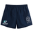 The NC Rugby Academy - Megalodons Tactic Short by EMB Canterbury are navy blue lightweight men's rugby shorts with an elastic waistband, a shark logo and "Megalodons Rugby Academy" text on the left leg, inspired by classic Canterbury designs.