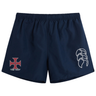 The SF CDME Rugby Tactic Short by EMB Canterbury comes in navy blue and features a white Canterbury logo on the right leg, along with a red and white "Cove Rugby" cross emblem on the left leg. These men's lightweight shorts are designed for comfort and performance both on and off the field.