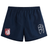The Montgomery Bucks Griffins Tactic Short by EMB Canterbury features a navy blue design with an elastic waistband, white abstract logo on the right leg, and red and white lion crest on the left—ideal for rugby or daily wear.