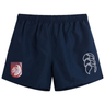 The Montgomery Bucks Griffins Tactic Short by EMB Canterbury features a navy blue design with an elastic waistband, white abstract logo on the right leg, and red and white lion crest on the left—ideal for rugby or daily wear.