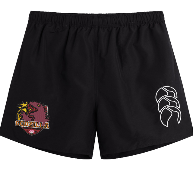 The Godzilla Rugby Football Club Tactic Short by EMB Canterbury features a black design with a “Godzilla” logo on the left leg and a white abstract symbol on the right leg. Perfect for rugby or casual wear, these men’s shorts offer athletic style and durability.