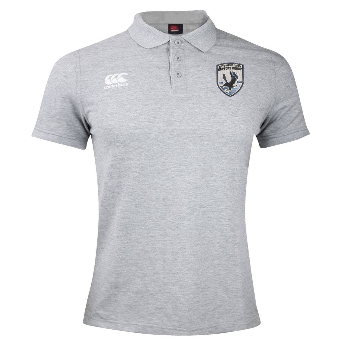 Introducing the South Orange County Raptors Waimak Polo by EMB Canterbury—a light grey men’s rugby polo featuring a classic collar and a three-button placket. The CCC Canterbury logo is embroidered on the right chest, while the striking South Orange County Raptors crest with a bird emblem adorns the left. This rugby polo combines sporty style with everyday comfort.