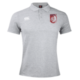 The Montgomery Bucks Griffins Waimak Polo by EMB Canterbury features a light grey design, white Canterbury logo on the right chest, and a maroon lion crest with "MERU" text on the left—classic men's style for casual or sporty looks.