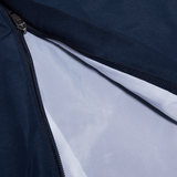 A close up of the zipper of a Canterbury Open Hem Stadium Pant by Canterbury.