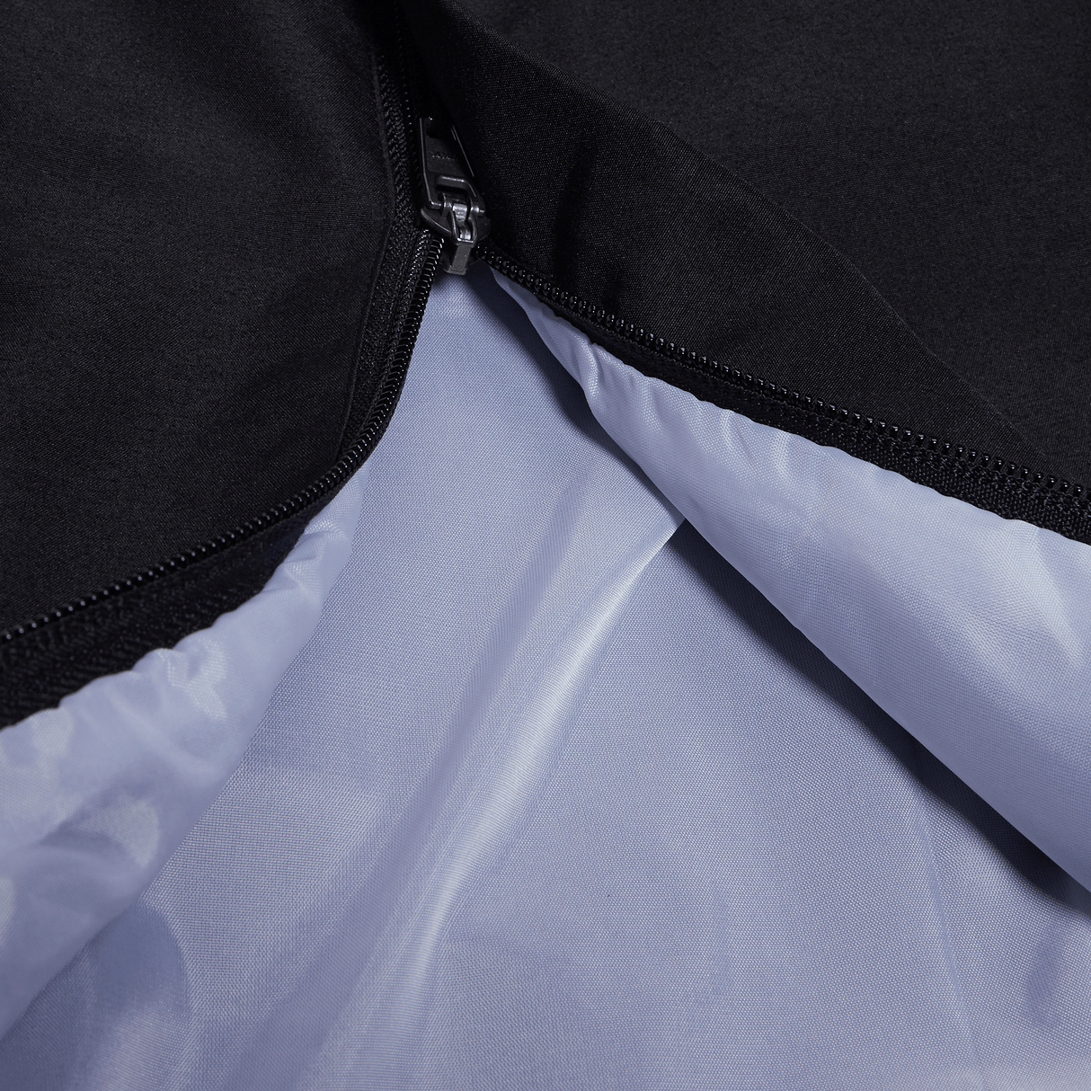 A close up of a black and white Canterbury Open Hem Stadium Pant.