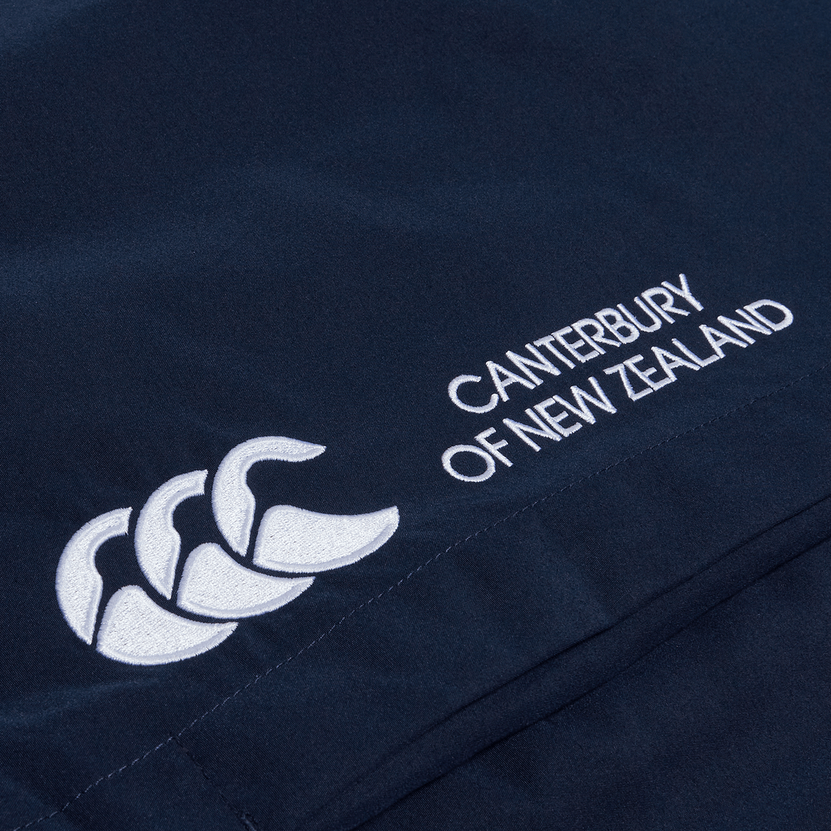 A Canterbury Cuffed Hem Stadium Pant with a white logo on it.
