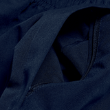 A close up of a Canterbury black jacket with a zipper.