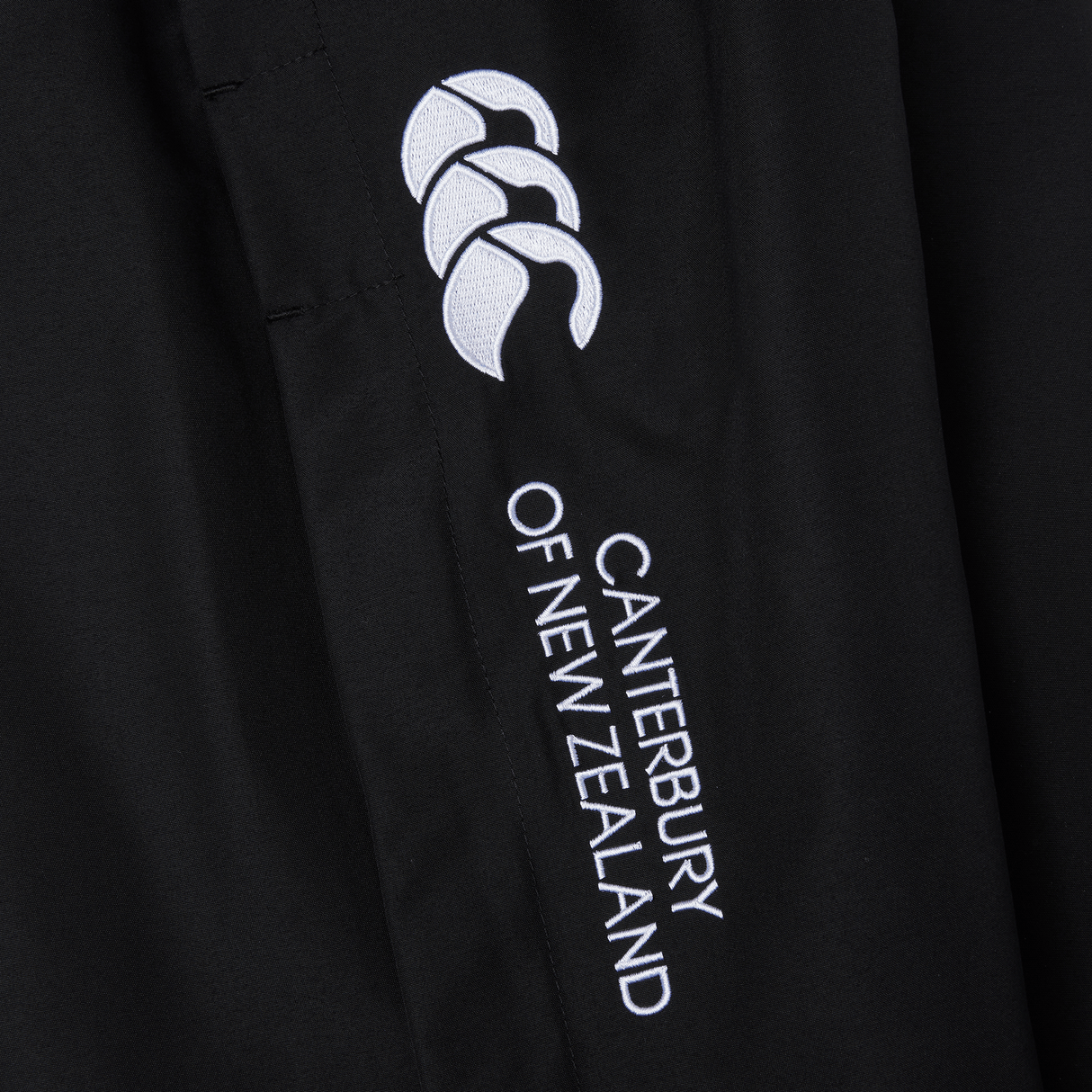 A Canterbury Cuffed Hem Stadium Pant with a white logo on it.