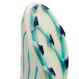 Close-up of the sole of the Canterbury Speed Falcon 2.0 Elite FG-WHITE/BALTIC GREEN soccer cleat by Canterbury, featuring a white base accented with blue and turquoise studs arranged in a zigzag pattern, reminiscent of the agile design characteristic of lightweight rugby cleats.
