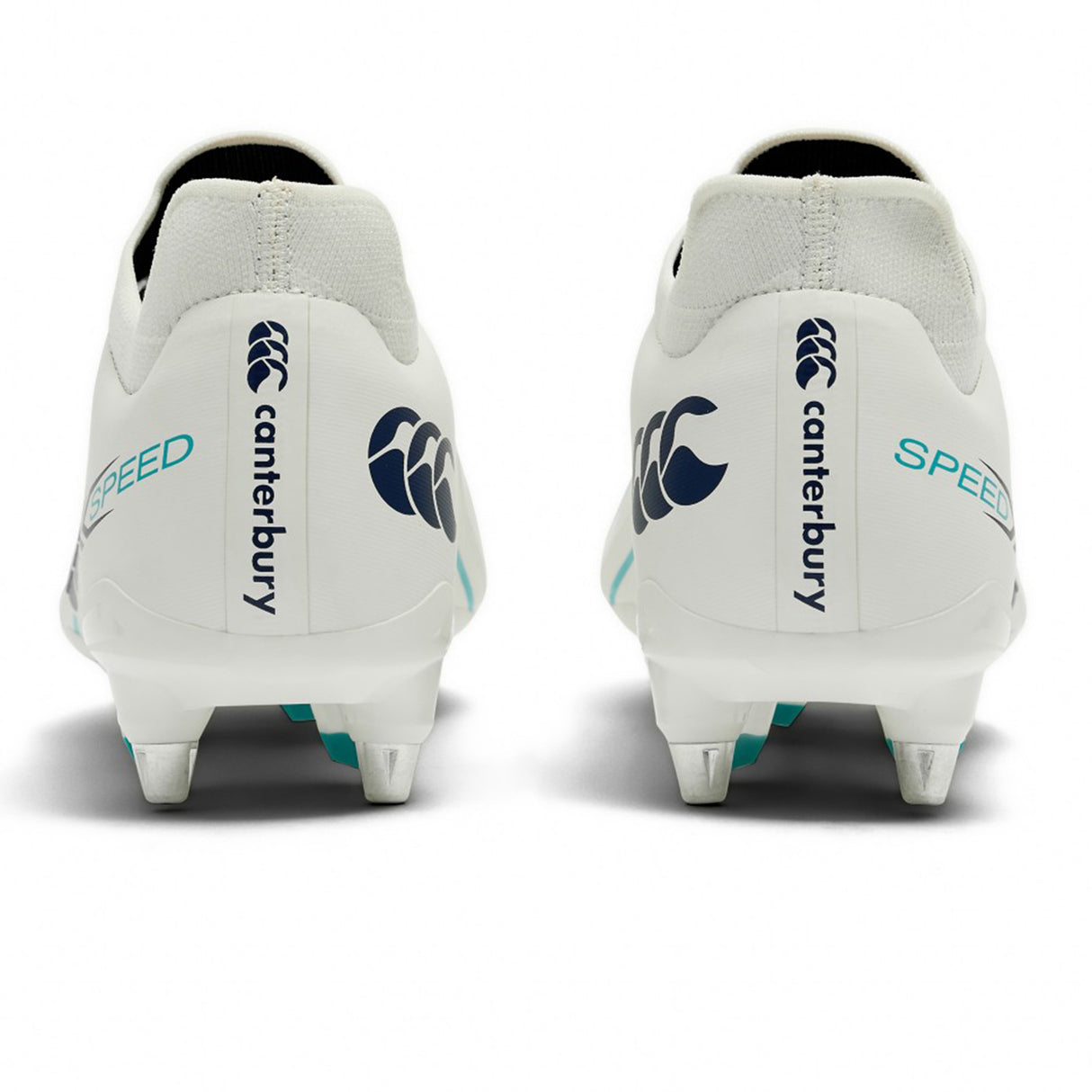 Rear view of the Canterbury Speed Falcon 2.0 Pro SG rugby boots in white and Baltic green, engineered by Canterbury for lightweight performance, featuring bold blue Canterbury logos, “SPEED” text, and metal studs on the soles to deliver superior traction on soft ground.