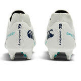Rear view of the Canterbury Speed Falcon 2.0 Pro SG rugby boots in white and Baltic green, engineered by Canterbury for lightweight performance, featuring bold blue Canterbury logos, “SPEED” text, and metal studs on the soles to deliver superior traction on soft ground.