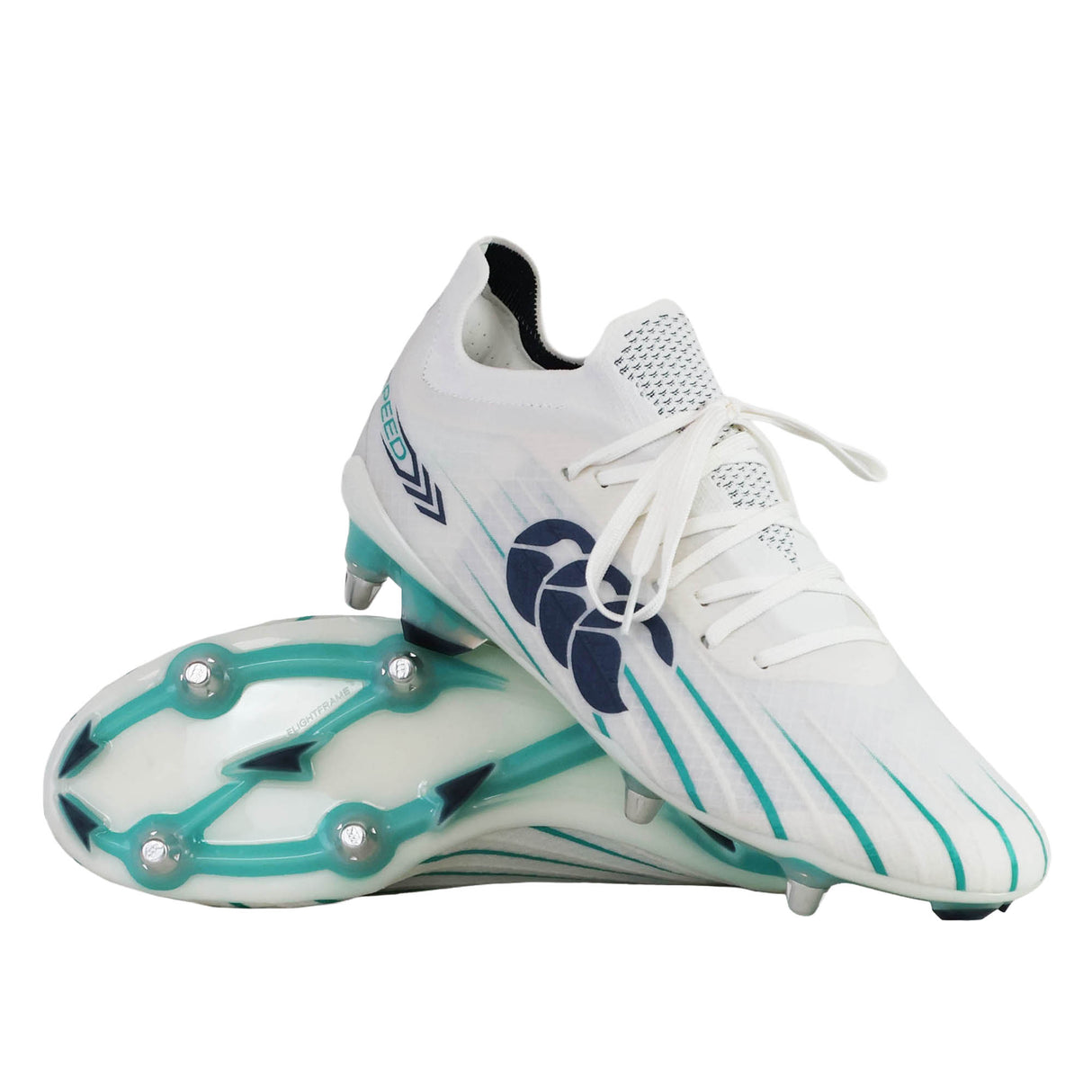 A pair of white and teal Speed Falcon 2.0 Elite SG rugby boots with black and blue accents, one shoe upright and the other positioned sole-up to show the studded soft ground bottom.