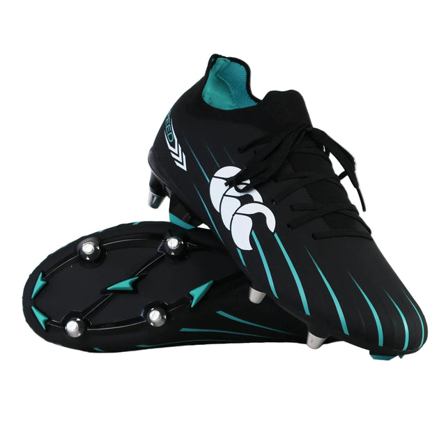 A pair of Canterbury Speed Falcon 2.0 Pro SG soccer cleats in Jet Black with Baltic Green accents and white Canterbury logos, one standing upright and the other displaying the metal soft ground studs—ideal for rugby or soccer on soft ground surfaces.