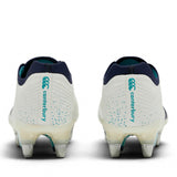 Back view of two white Canterbury Stampede Groundbreak Elite SG Rugby Boots featuring metal studs and teal accents on the heel.