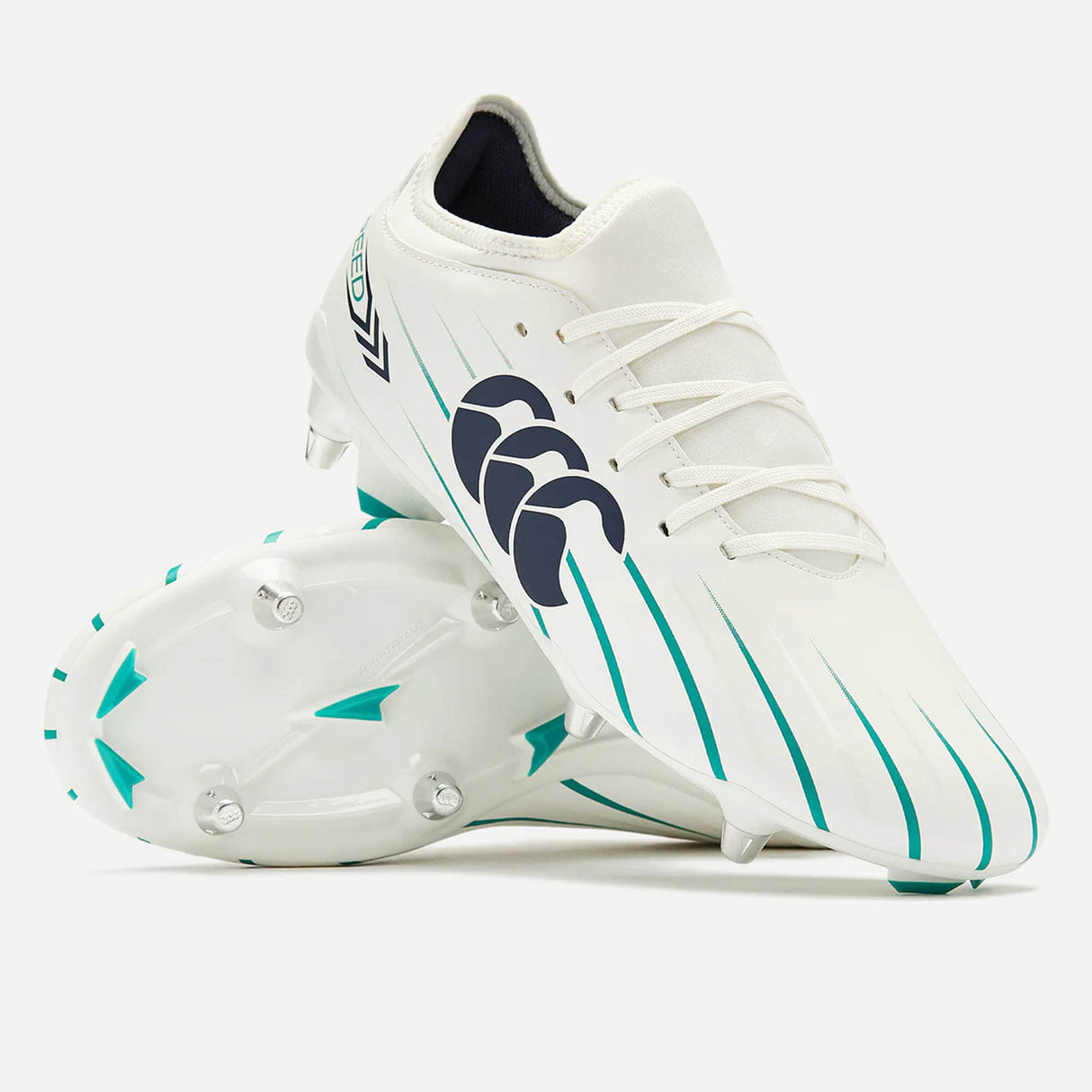 A pair of Canterbury Speed Falcon 2.0 Team SG football boots in white with Baltic Green accents, featuring metal studs and a black Canterbury logo on the side, displayed on a white background.