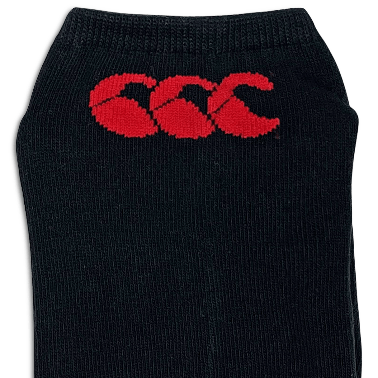 A Canterbury cotton no-show sock with the red Canterbury logo on it.