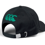 The Ireland 24 Drill Cap by Canterbury is a black adjustable cotton cap, featuring a green Canterbury logo on the back. It includes an adjustable strap with a metal buckle for a customized fit.