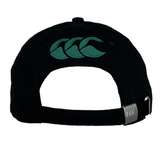The Ireland 24 Drill Cap by Canterbury is a black adjustable cotton cap featuring a green CCC Ireland logo embroidery on the back and an adjustable strap with a metal buckle.