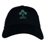 An Ireland 24 Drill Cap by Canterbury in black, featuring a green logo with shamrocks and the letters "IRFU" embroidered on the front.
