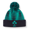 The Ireland 26 Bobble Hat by Canterbury is a green and black knitted acrylic beanie with a black cuff, topped with a pom-pom. It features the IRFU logo—complete with shamrock and rugby ball—embroidered on the front, making it an essential addition to any Ireland Rugby hat collection.