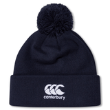The Scotland Shield Pom Pom Beanie by EMB Canterbury is navy blue with a white logo on the brim, perfect for stylish comfort.