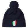 The newly released navy blue Italy Shield Pom Pom Beanie from EMB Canterbury features a striking shield emblem on the front.