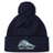 Navy blue University of New Hampshire Pom Pom Beanie by Canterbury, featuring a wildcat mascot logo and “MEN’S RUGBY” text on the cuff.