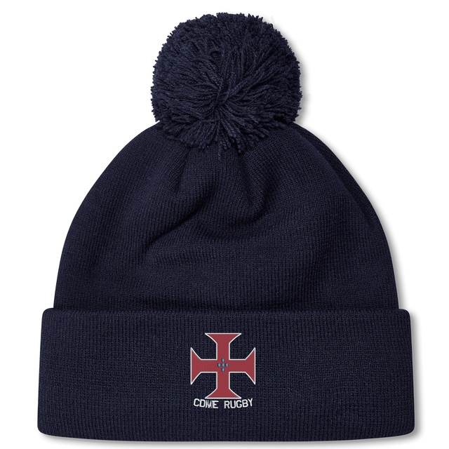 Stay warm and stylish on chilly match days with the SF CDME Rugby Pom Pom Beanie by Canterbury. This cozy navy knit beanie from EMB Canterbury features a playful pom-pom on top, a red and white cross emblem, and "CDME RUGBY" text embroidered on the front—perfect for rugby fans looking to show their team spirit.