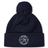 The Saint Anselm College Club Rugby Pom Pom Beanie by EMB Canterbury is a navy blue beanie with a pom-pom, featuring an embroidered white "SA" logo and "Saint Anselm Men's Club Rugby" text on the front cuff.