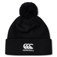 Black knit beanie hat with black pompom on top and white CCC logo on cuff.