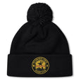 The Pittsburgh Forge Pom Pom Beanie by Canterbury features a black knit design, cuff logo patch, and pom-pom on top—an EMB Canterbury custom rugby hat inspired by the classic Canterbury Rugby Beanie style.