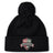 The NOVA Barbarians Pom Pom Beanie by EMB Canterbury is a black fleece-lined hat with a pom-pom and features the "NOVA Barbarians" rugby ball logo on the front cuff.