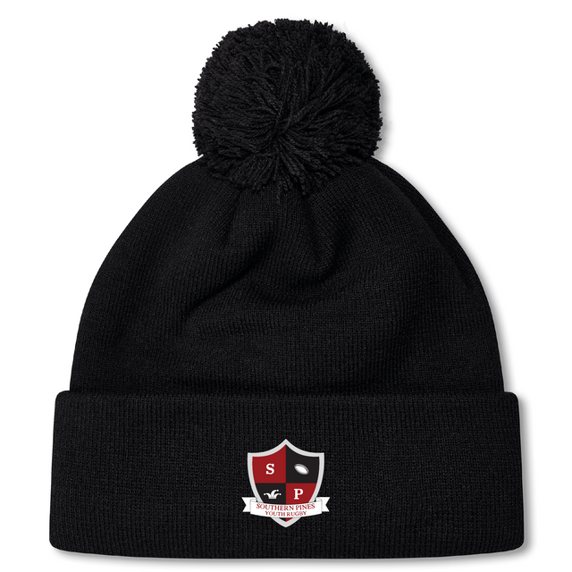 Black fleece-lined bobble hat featuring a pom-pom and the Southern Pines Youth Rugby logo on the brim, by EMB Canterbury.