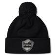 Black ICRON Pom Pom Beanie by Canterbury, featuring a pom pom and a patch with a rugby ball above the word “ICRON.”