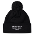The Hornets Rugby Club 1977 Pom Pom Beanie by Canterbury from EMB Canterbury features a black knit design in the classic Canterbury bobble hat style, with a pom-pom on top and white embroidered "hornets RUGBY CLUB 1977" text on the front cuff.