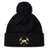 Mother Lode Pom Pom Beanie by Canterbury in black, featuring a pom-pom and an embroidered emblem of crossed yellow pickaxes and a rugby ball.