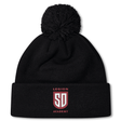 Black fleece-lined Legion Academy Pom Pom Beanie by Canterbury featuring a pom-pom on top and a shield-shaped logo with the letters “SD,” “LEGION” above, and “ACADEMY” below.